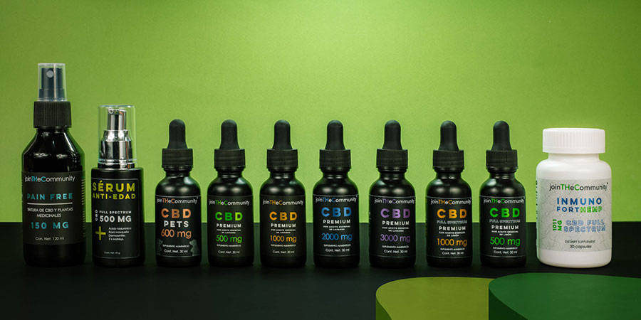 several bottles of CBD products lined up in a row